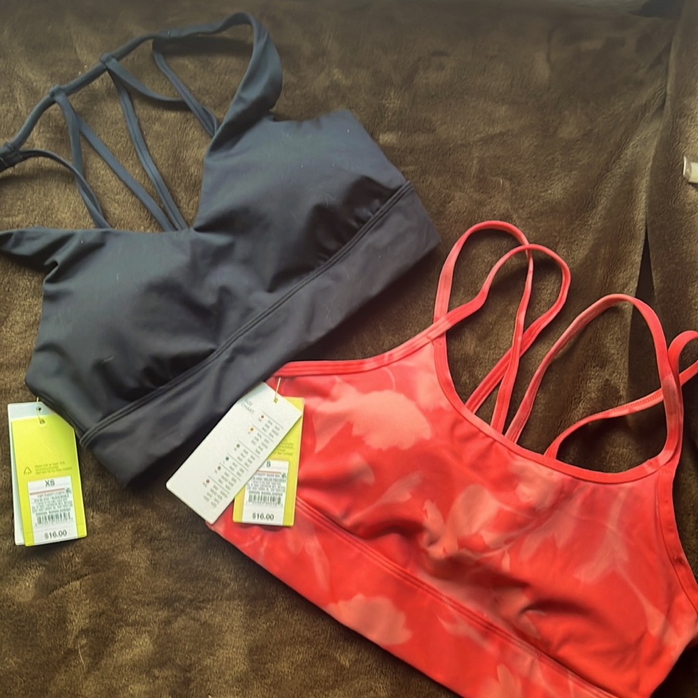 All in motion sports bras pink one is size small and black xs